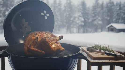 Premium outdoor smoker setup with a turkey being prepared for Thanksgiving, featuring essential smoking tools like digital thermometers, injection kits, smoking woods, and heat-resistant gloves arranged around a stainless steel smoker