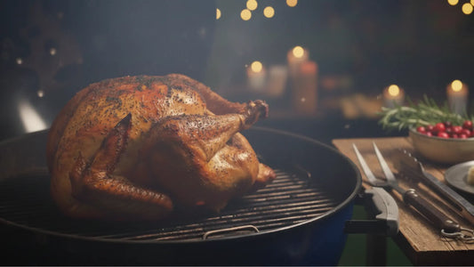 A beautifully spatchcocked turkey grilling on a premium stainless steel grill with smoke rising, Thanksgiving setting, fall decorations nearby, professional food photography