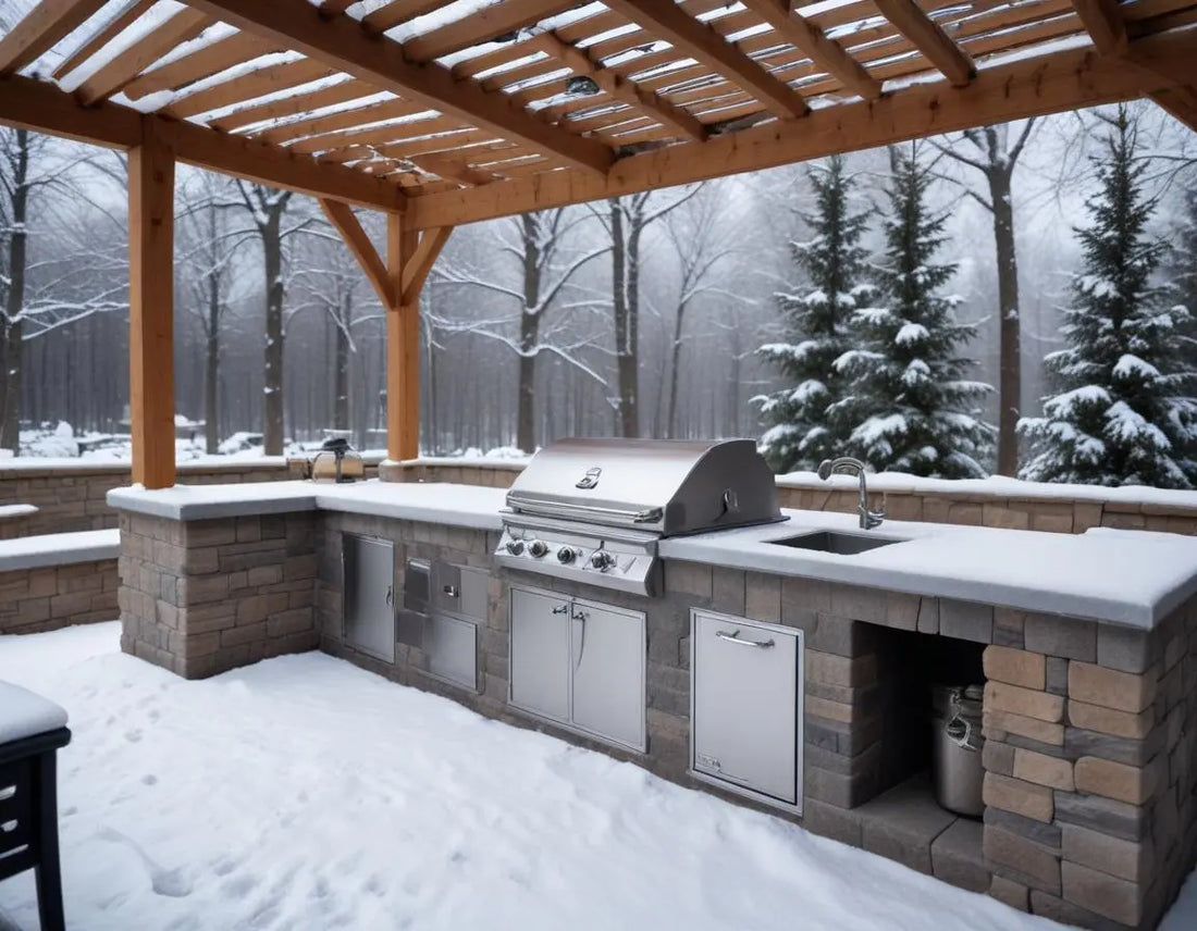 Premium outdoor kitchen in winter with high-quality grill protected by weather-resistant cover, light snow surrounding, professional lighting showing winterization elements and protection features